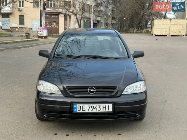 Черный Опель Астра, объемом двигателя 1.4 л и пробегом 307 тыс. км за 2499 $, фото 1 на Automoto.ua