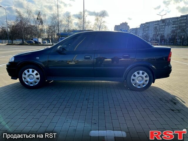 Черный Опель Астра, объемом двигателя 1.4 л и пробегом 176 тыс. км за 4000 $, фото 1 на Automoto.ua