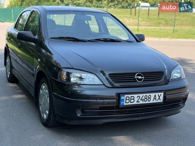 Черный Опель Астра, объемом двигателя 1.4 л и пробегом 254 тыс. км за 4499 $, фото 1 на Automoto.ua