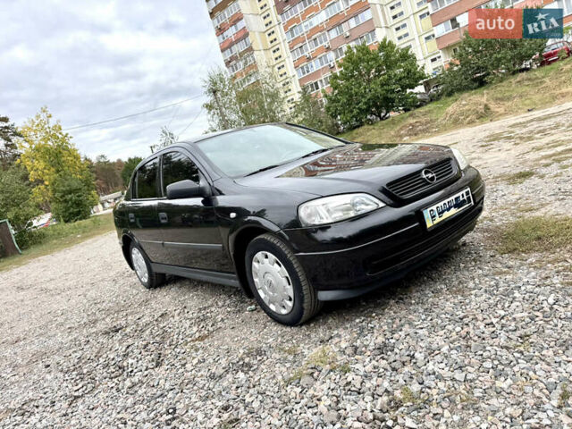 Черный Опель Астра, объемом двигателя 1.4 л и пробегом 176 тыс. км за 4390 $, фото 1 на Automoto.ua