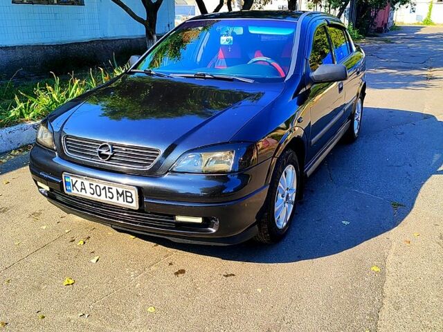 Черный Опель Астра, объемом двигателя 1.4 л и пробегом 141 тыс. км за 3500 $, фото 1 на Automoto.ua