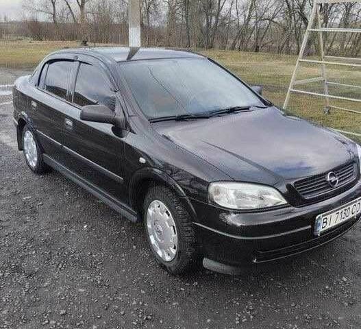 Черный Опель Астра, объемом двигателя 1.6 л и пробегом 85 тыс. км за 7000 $, фото 1 на Automoto.ua