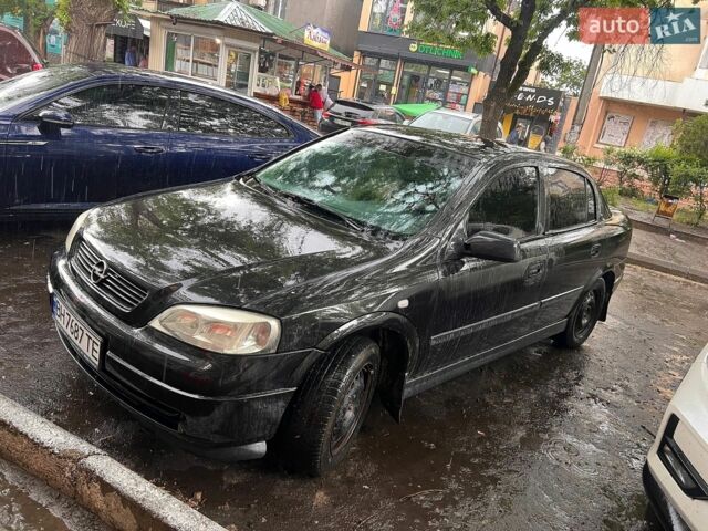 Черный Опель Астра, объемом двигателя 1.36 л и пробегом 188 тыс. км за 3500 $, фото 1 на Automoto.ua