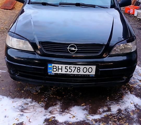 Черный Опель Астра, объемом двигателя 1.6 л и пробегом 256 тыс. км за 3300 $, фото 1 на Automoto.ua