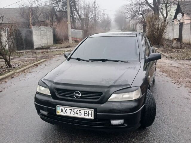 Черный Опель Астра, объемом двигателя 1.4 л и пробегом 362 тыс. км за 2600 $, фото 1 на Automoto.ua