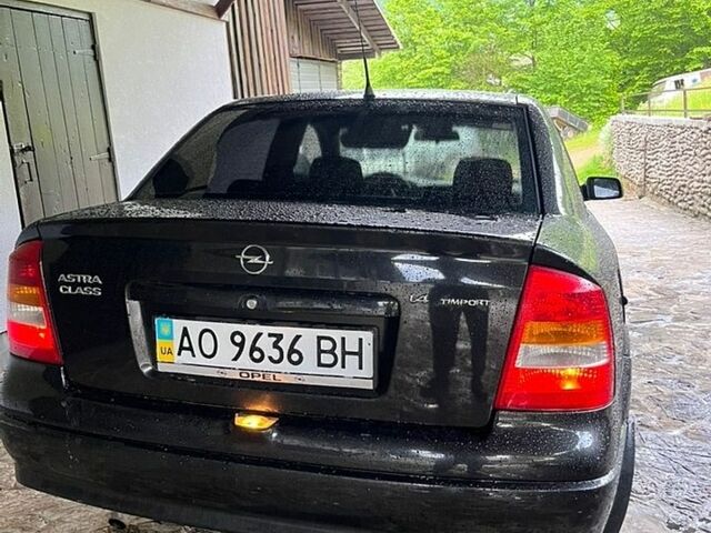 Черный Опель Астра, объемом двигателя 1.39 л и пробегом 250 тыс. км за 2350 $, фото 1 на Automoto.ua