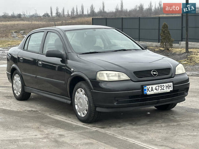 Чорний Опель Астра, об'ємом двигуна 1.36 л та пробігом 268 тис. км за 3600 $, фото 1 на Automoto.ua