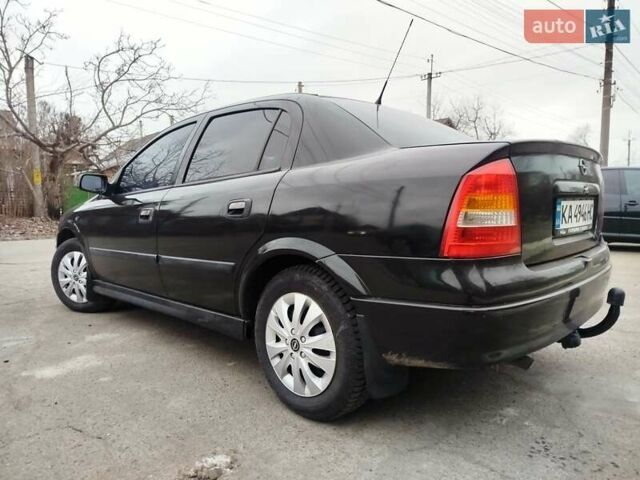 Черный Опель Астра, объемом двигателя 1.4 л и пробегом 220 тыс. км за 3999 $, фото 1 на Automoto.ua