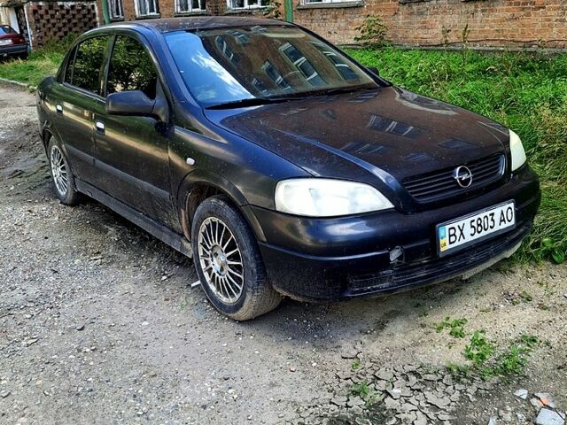 Черный Опель Астра, объемом двигателя 1.4 л и пробегом 300 тыс. км за 1300 $, фото 1 на Automoto.ua