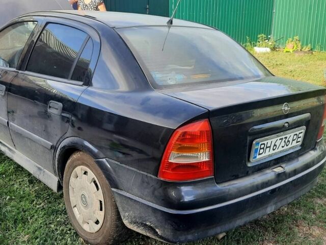 Черный Опель Астра, объемом двигателя 1.6 л и пробегом 100 тыс. км за 2700 $, фото 1 на Automoto.ua