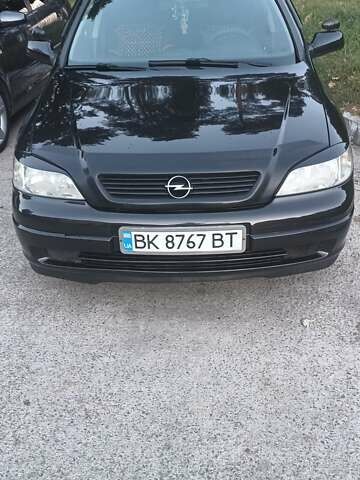 Черный Опель Астра, объемом двигателя 1.6 л и пробегом 290 тыс. км за 4300 $, фото 1 на Automoto.ua