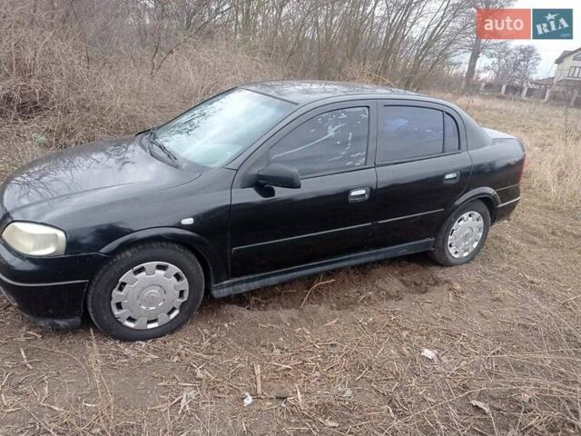Черный Опель Астра, объемом двигателя 1.6 л и пробегом 210 тыс. км за 3200 $, фото 1 на Automoto.ua