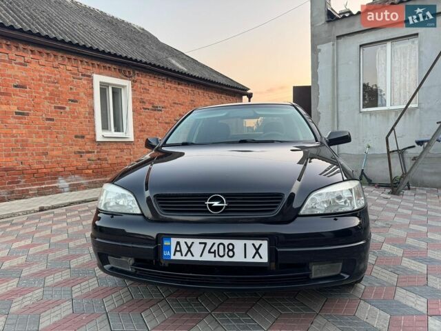 Черный Опель Астра, объемом двигателя 1.36 л и пробегом 176 тыс. км за 3500 $, фото 1 на Automoto.ua