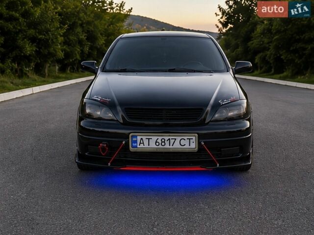 Черный Опель Астра, объемом двигателя 1.39 л и пробегом 200 тыс. км за 3600 $, фото 1 на Automoto.ua