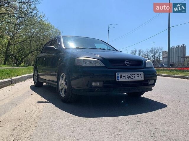 Черный Опель Астра, объемом двигателя 1.4 л и пробегом 247 тыс. км за 3300 $, фото 1 на Automoto.ua