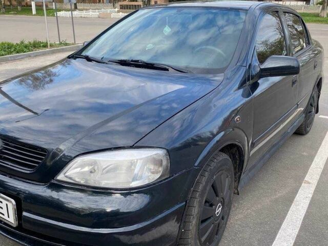 Черный Опель Астра, объемом двигателя 1.4 л и пробегом 293 тыс. км за 2900 $, фото 1 на Automoto.ua