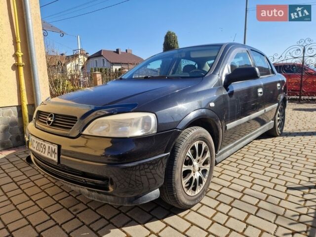 Черный Опель Астра, объемом двигателя 1.4 л и пробегом 266 тыс. км за 3200 $, фото 1 на Automoto.ua