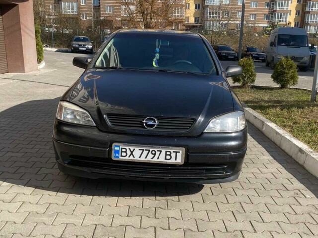 Черный Опель Астра, объемом двигателя 1.4 л и пробегом 253 тыс. км за 4100 $, фото 1 на Automoto.ua