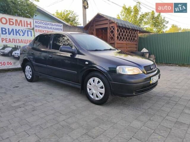 Черный Опель Астра, объемом двигателя 1.6 л и пробегом 100 тыс. км за 2800 $, фото 1 на Automoto.ua