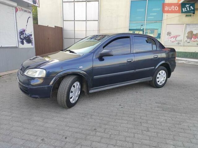 Черный Опель Астра, объемом двигателя 1.6 л и пробегом 100 тыс. км за 3300 $, фото 1 на Automoto.ua