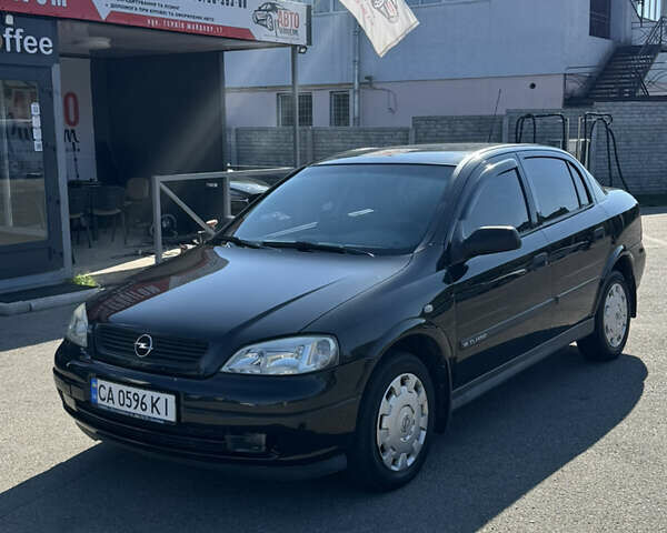 Чорний Опель Астра, об'ємом двигуна 1.6 л та пробігом 176 тис. км за 4700 $, фото 1 на Automoto.ua