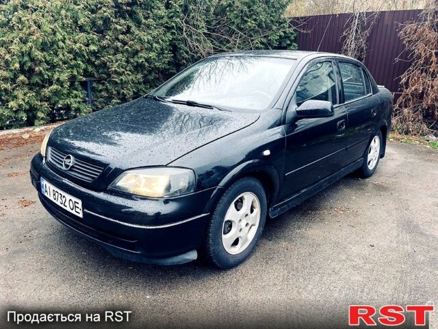 Черный Опель Астра, объемом двигателя 1.7 л и пробегом 298 тыс. км за 3400 $, фото 1 на Automoto.ua