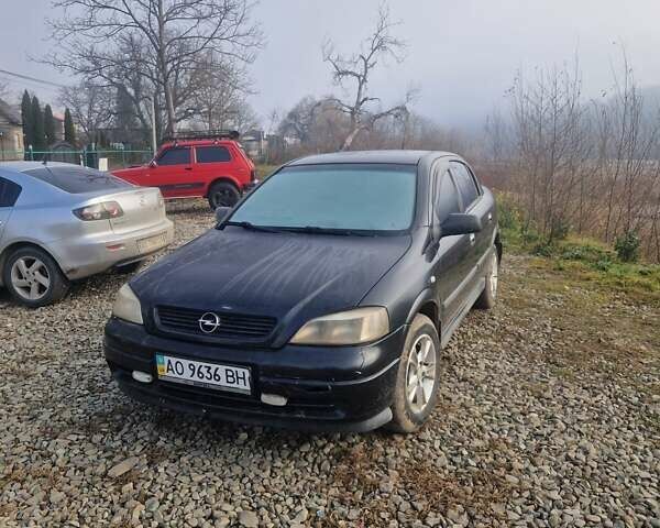 Черный Опель Астра, объемом двигателя 1.39 л и пробегом 180 тыс. км за 2550 $, фото 1 на Automoto.ua