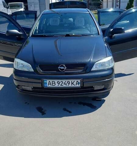 Черный Опель Астра, объемом двигателя 1.4 л и пробегом 105 тыс. км за 4800 $, фото 1 на Automoto.ua