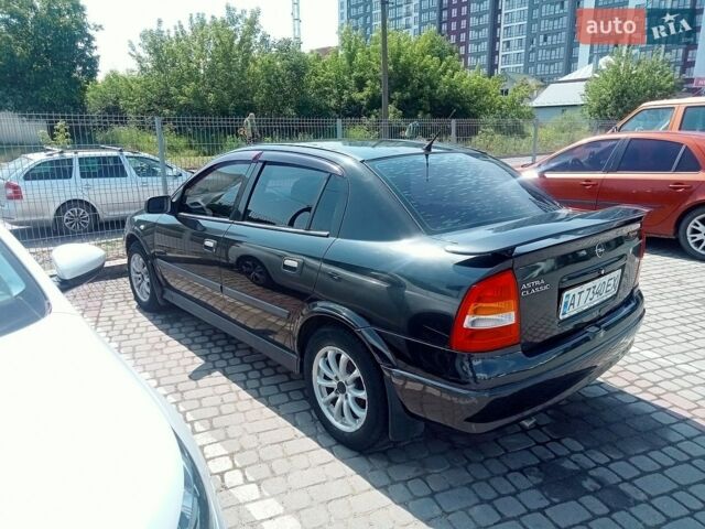 Черный Опель Астра, объемом двигателя 1.39 л и пробегом 150 тыс. км за 2300 $, фото 1 на Automoto.ua
