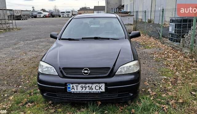 Черный Опель Астра, объемом двигателя 1.4 л и пробегом 180 тыс. км за 3800 $, фото 1 на Automoto.ua