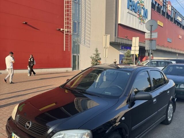 Черный Опель Астра, объемом двигателя 1.6 л и пробегом 300 тыс. км за 2500 $, фото 1 на Automoto.ua