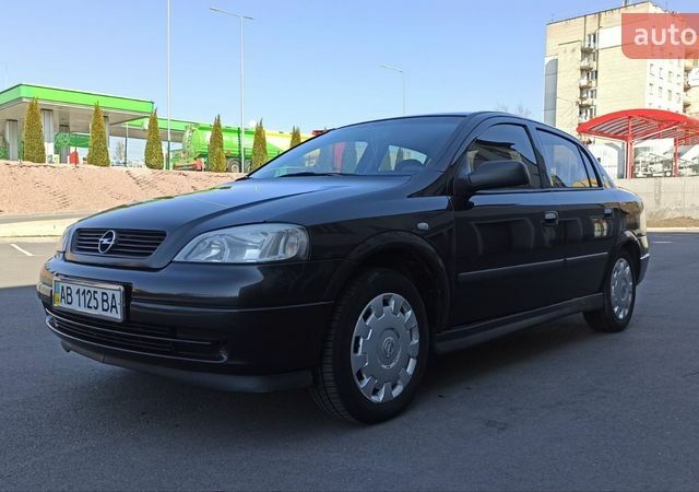 Черный Опель Астра, объемом двигателя 1.4 л и пробегом 148 тыс. км за 4900 $, фото 1 на Automoto.ua