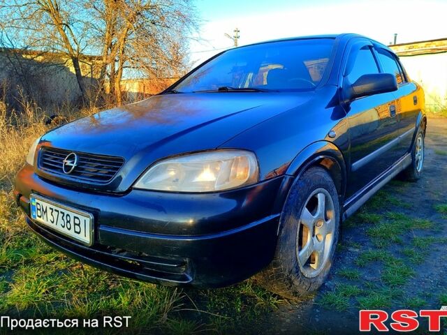 Черный Опель Астра, объемом двигателя 1.4 л и пробегом 250 тыс. км за 3200 $, фото 1 на Automoto.ua