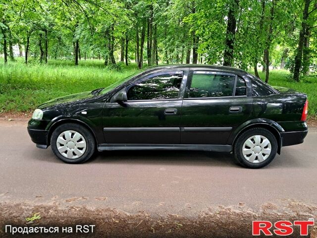 Черный Опель Астра, объемом двигателя 1.4 л и пробегом 200 тыс. км за 3499 $, фото 1 на Automoto.ua