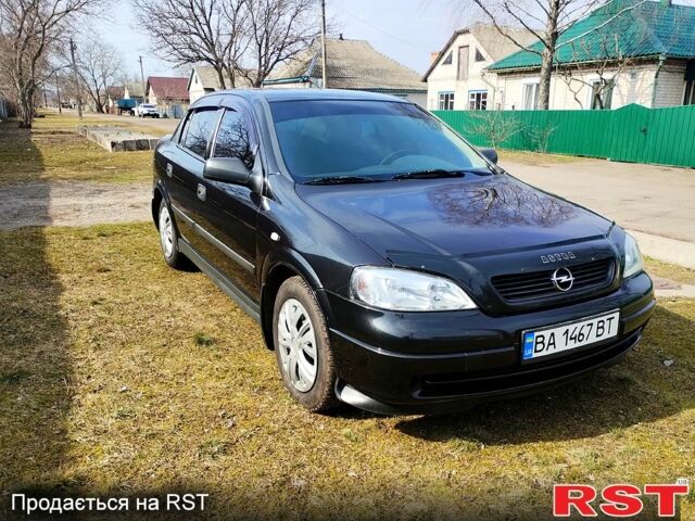 Черный Опель Астра, объемом двигателя 1.6 л и пробегом 194 тыс. км за 5200 $, фото 1 на Automoto.ua