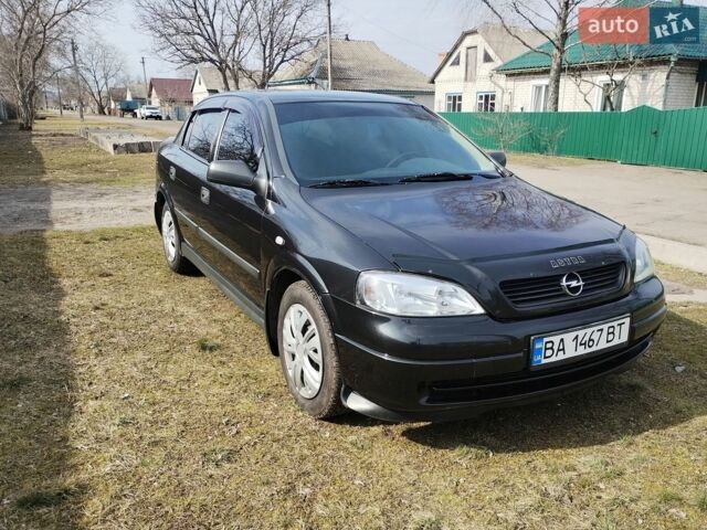 Черный Опель Астра, объемом двигателя 1.6 л и пробегом 194 тыс. км за 5200 $, фото 1 на Automoto.ua