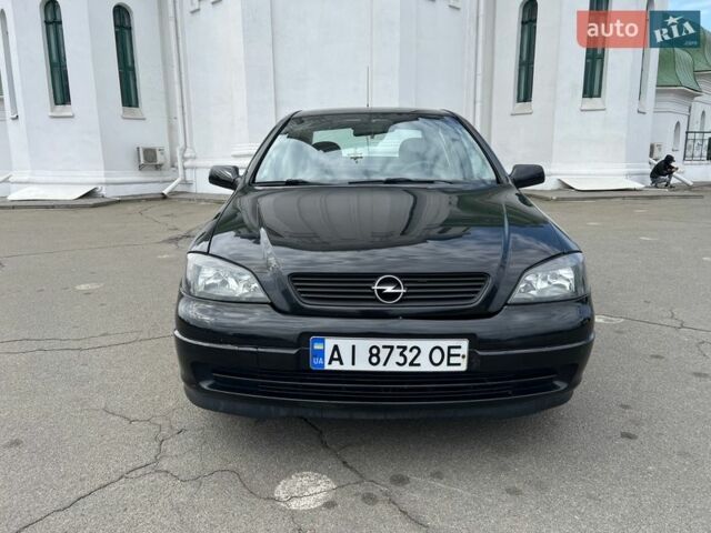 Черный Опель Астра, объемом двигателя 1.7 л и пробегом 260 тыс. км за 3000 $, фото 1 на Automoto.ua