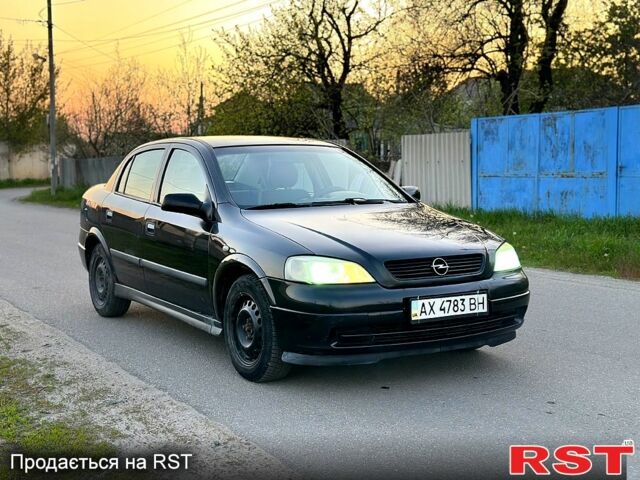 Черный Опель Астра, объемом двигателя 1.6 л и пробегом 166 тыс. км за 2000 $, фото 1 на Automoto.ua