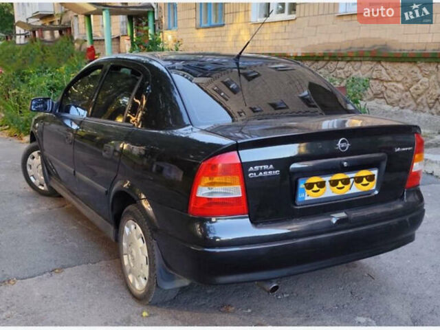 Черный Опель Астра, объемом двигателя 1.36 л и пробегом 176 тыс. км за 3700 $, фото 1 на Automoto.ua