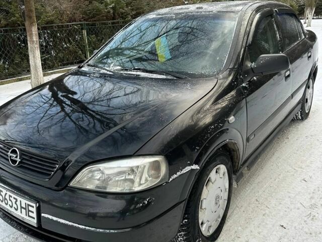 Черный Опель Астра, объемом двигателя 1.4 л и пробегом 620 тыс. км за 2800 $, фото 1 на Automoto.ua