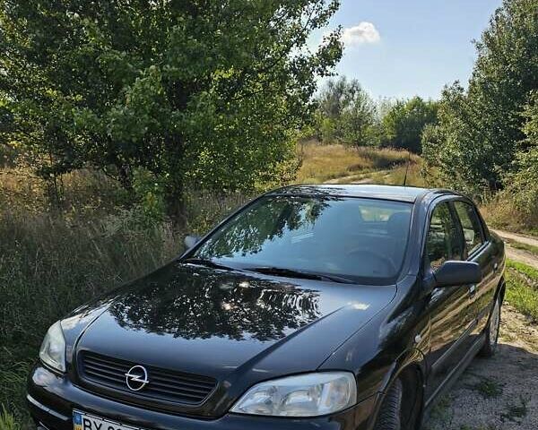 Черный Опель Астра, объемом двигателя 1.38 л и пробегом 144 тыс. км за 4600 $, фото 1 на Automoto.ua