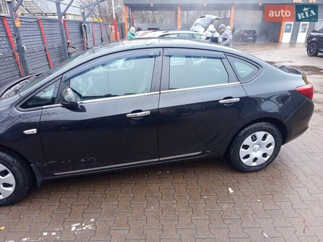 Черный Опель Астра, объемом двигателя 1.6 л и пробегом 253 тыс. км за 7999 $, фото 1 на Automoto.ua