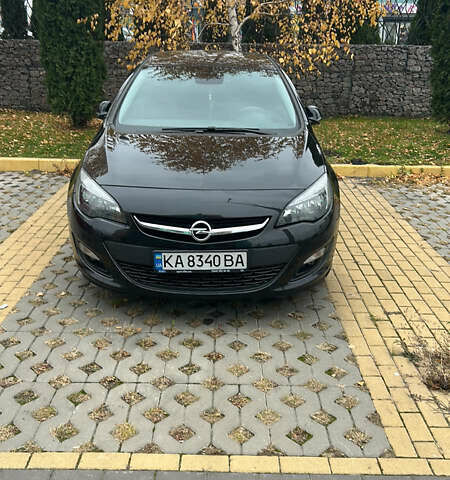 Чорний Опель Астра, об'ємом двигуна 1.4 л та пробігом 91 тис. км за 12300 $, фото 1 на Automoto.ua