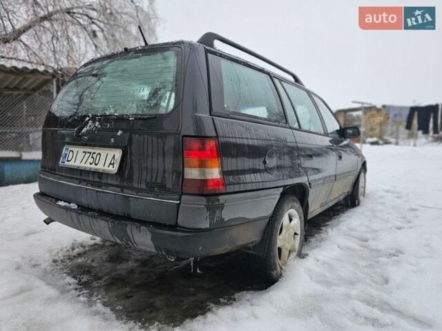 Черный Опель Астра, объемом двигателя 1.8 л и пробегом 320 тыс. км за 1100 $, фото 1 на Automoto.ua