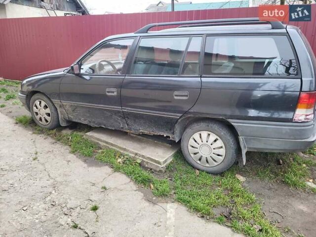 Черный Опель Астра, объемом двигателя 1.39 л и пробегом 325 тыс. км за 1150 $, фото 1 на Automoto.ua