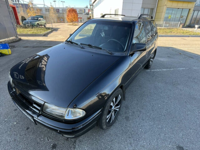 Черный Опель Астра, объемом двигателя 1.7 л и пробегом 590 тыс. км за 2300 $, фото 1 на Automoto.ua