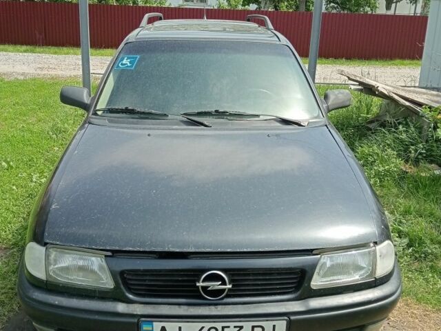 Чорний Опель Астра, об'ємом двигуна 1.6 л та пробігом 272 тис. км за 1100 $, фото 1 на Automoto.ua