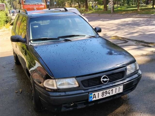 Чорний Опель Астра, об'ємом двигуна 2 л та пробігом 300 тис. км за 1234 $, фото 1 на Automoto.ua