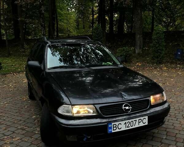 Черный Опель Астра, объемом двигателя 1.8 л и пробегом 340 тыс. км за 1100 $, фото 1 на Automoto.ua