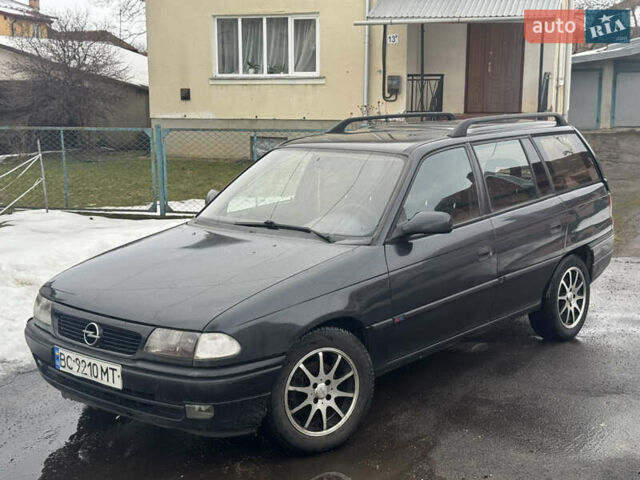 Черный Опель Астра, объемом двигателя 1.6 л и пробегом 271 тыс. км за 920 $, фото 1 на Automoto.ua